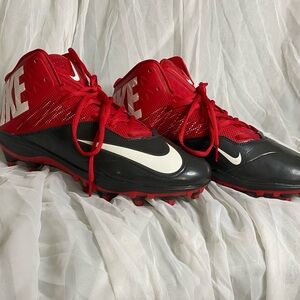 Nike black and red football cleats